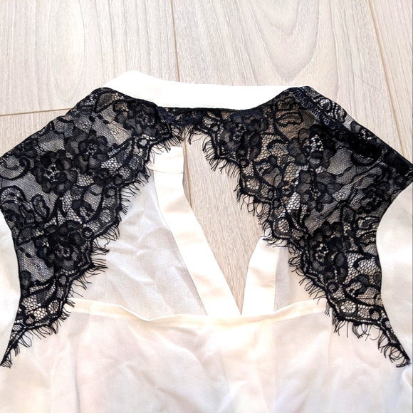 Maurices white blouse with black lace accent. Size small. - Picture 3 of 5